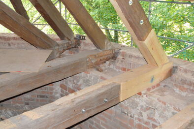 Erneuerter Balkenkopf